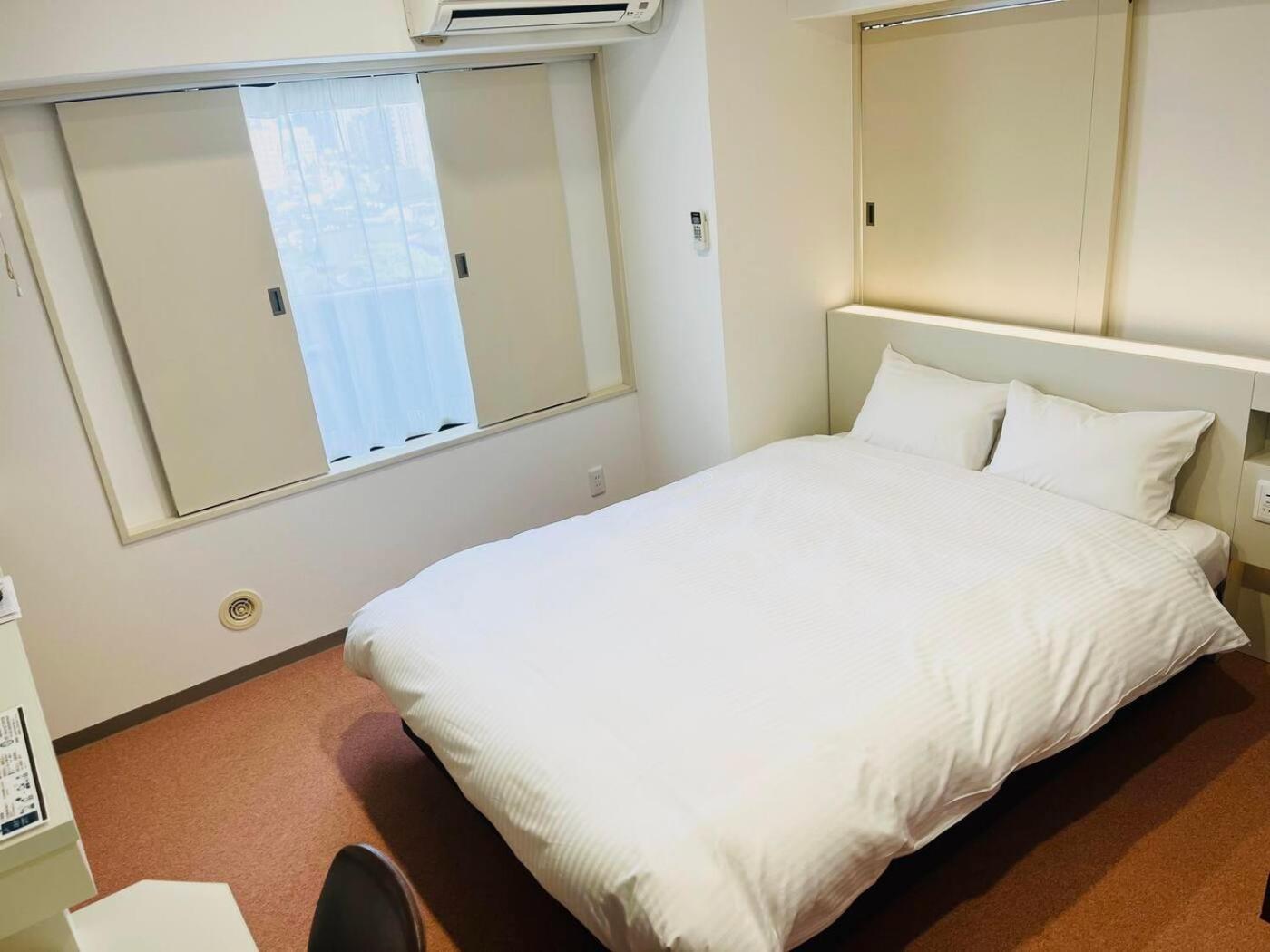 Hotel Alpha Inn Akita Quarto foto